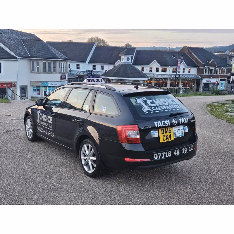 What services does a taxi service offer in Caerphilly?