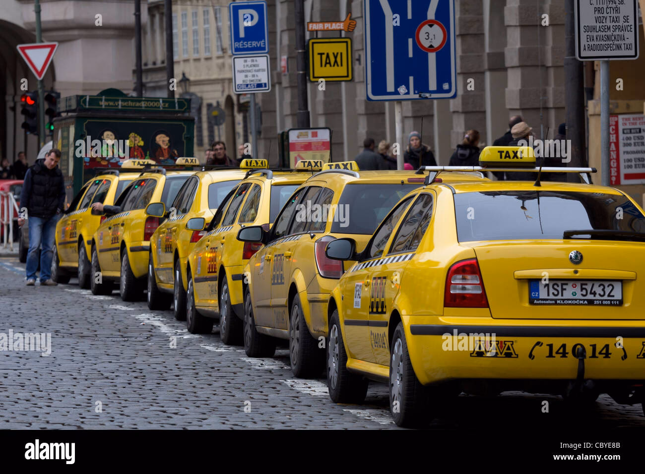 Are taxis lined up at the curb in Asia?
