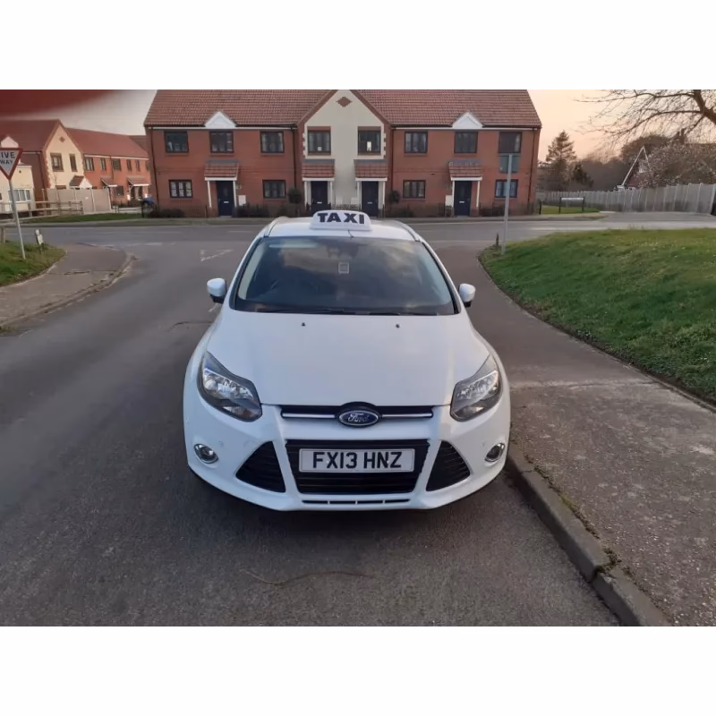 Who is town taxi & travel?