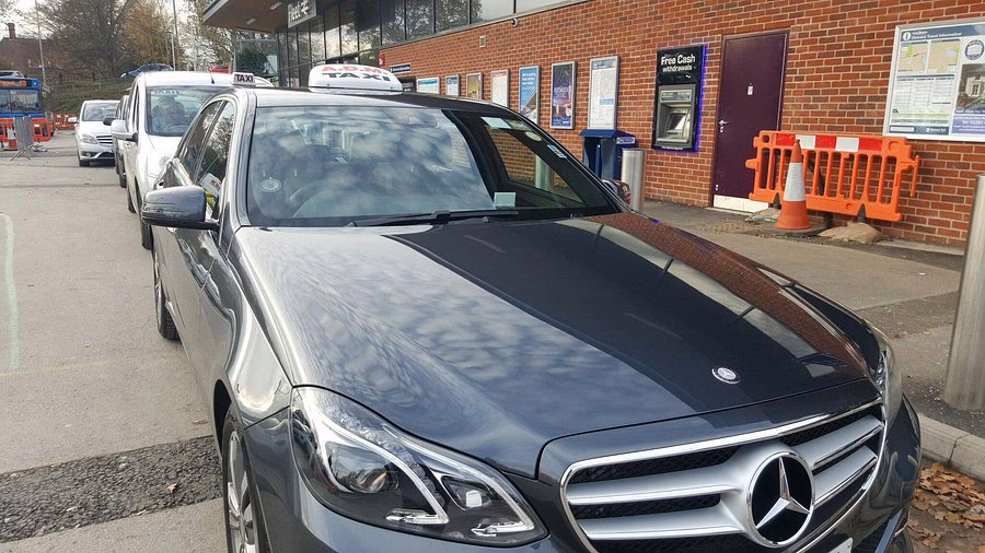 How do I book a taxi from or to Fleet Train Station?