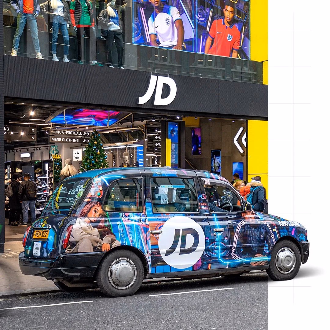 Who is ubiquitous taxi advertising?