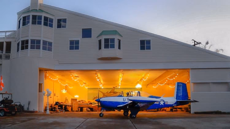 What is the minimum distance a building must be from a runway?