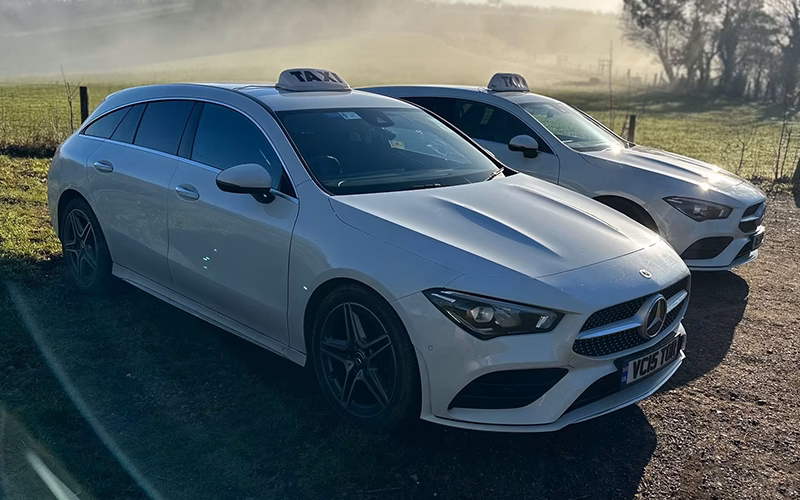 How many seater taxis are available at Badger cabs?