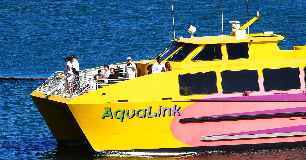 Where can I board the AquaLink water taxi?