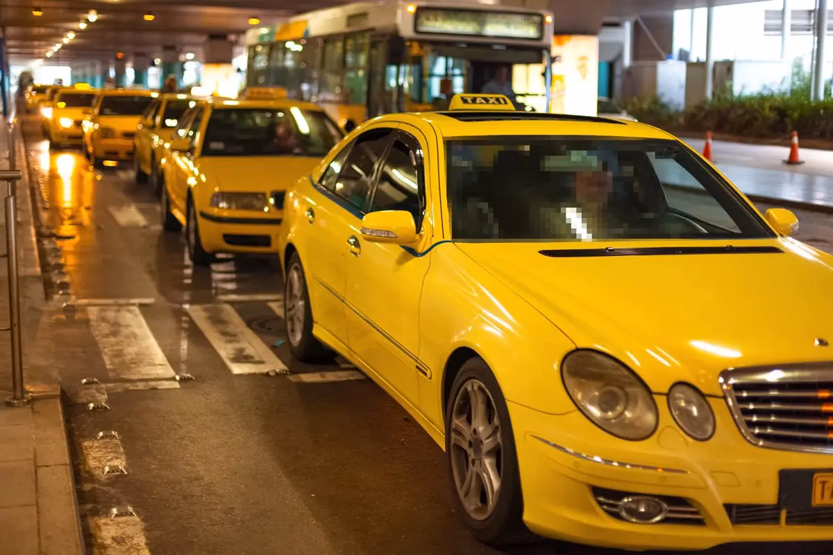 What companies run services from Rafina to Athens Airport (ATH)?