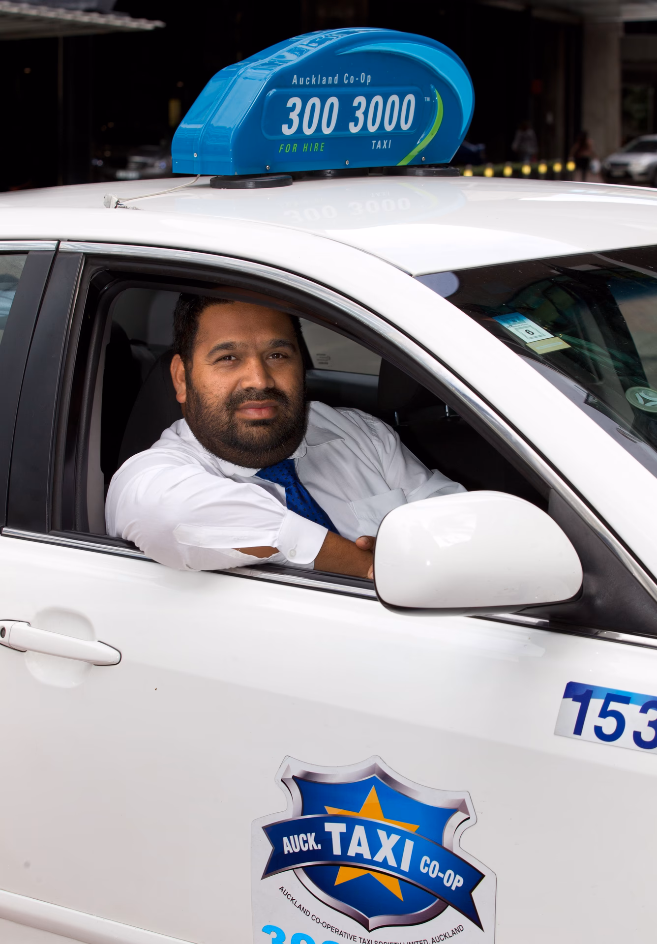 How do I book a taxi in Auckland?