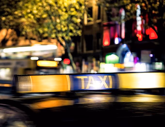 Does AXA offer taxi insurance?