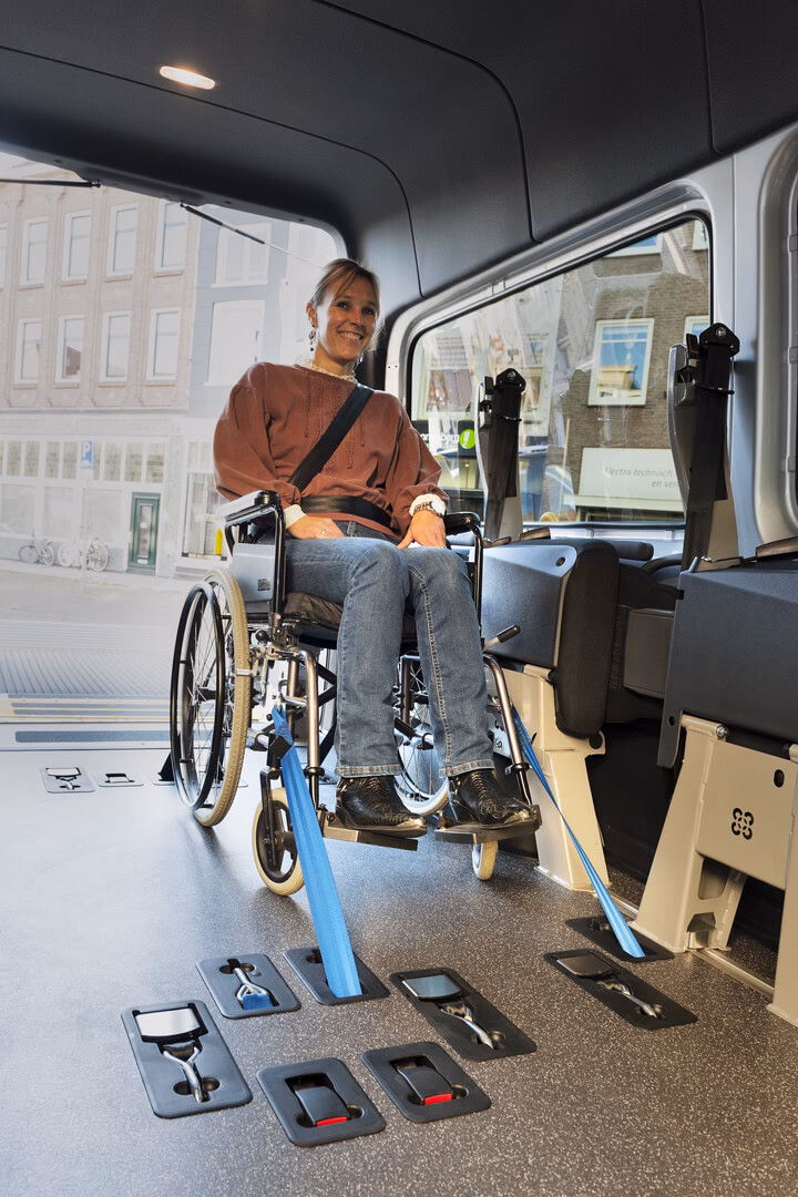 Can a driver transport a passenger in a wheelchair?