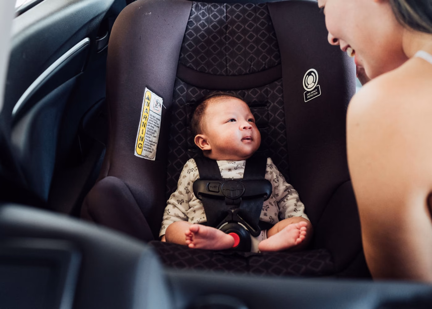 Does GrabFamily provide child and booster seats in Singapore?