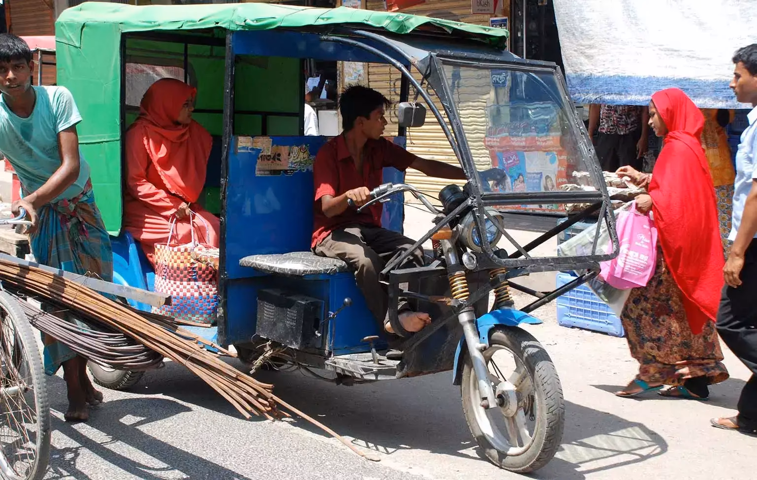 Is the electric three-wheeler industry regulated in Bangladesh?