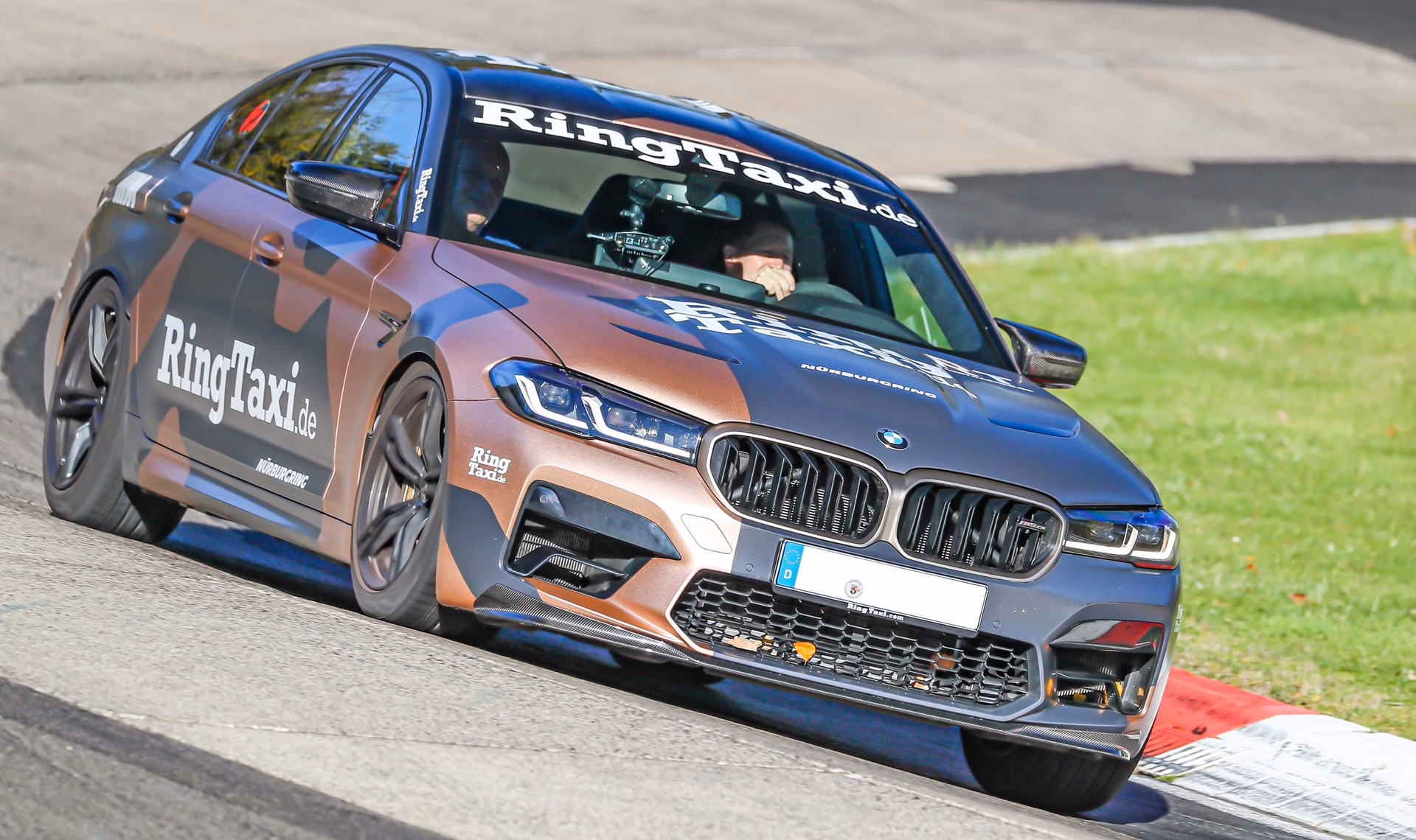 Who are the drivers of BMW M5 ring-taxi ride?