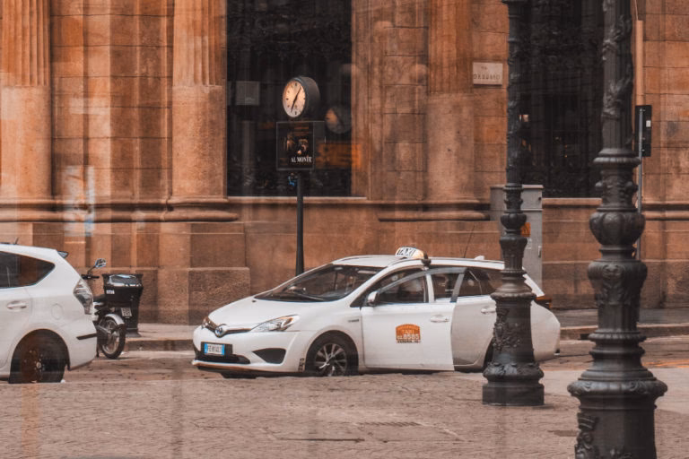 Why should you take a taxi in Milan?