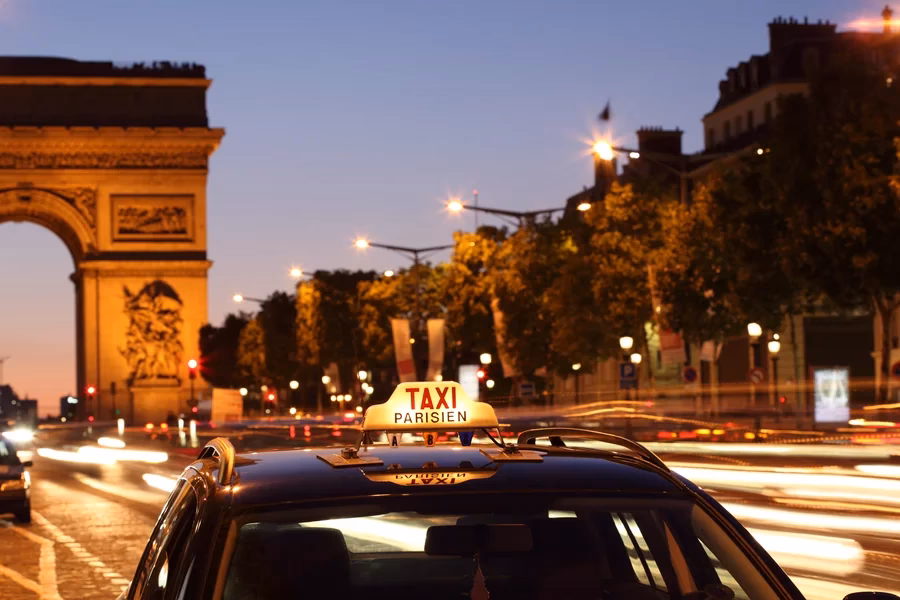 How do I book a taxi ride in Paris?