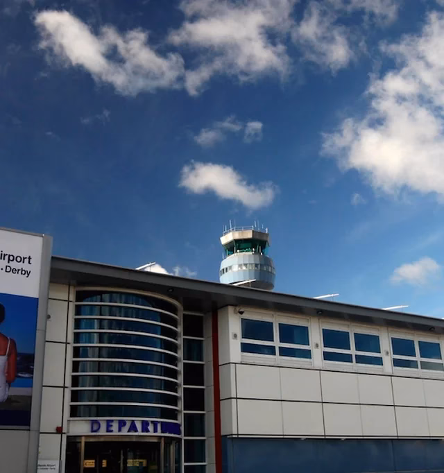 How do I pre-book a taxi to Birmingham Airport from Burton-on-Trent?
