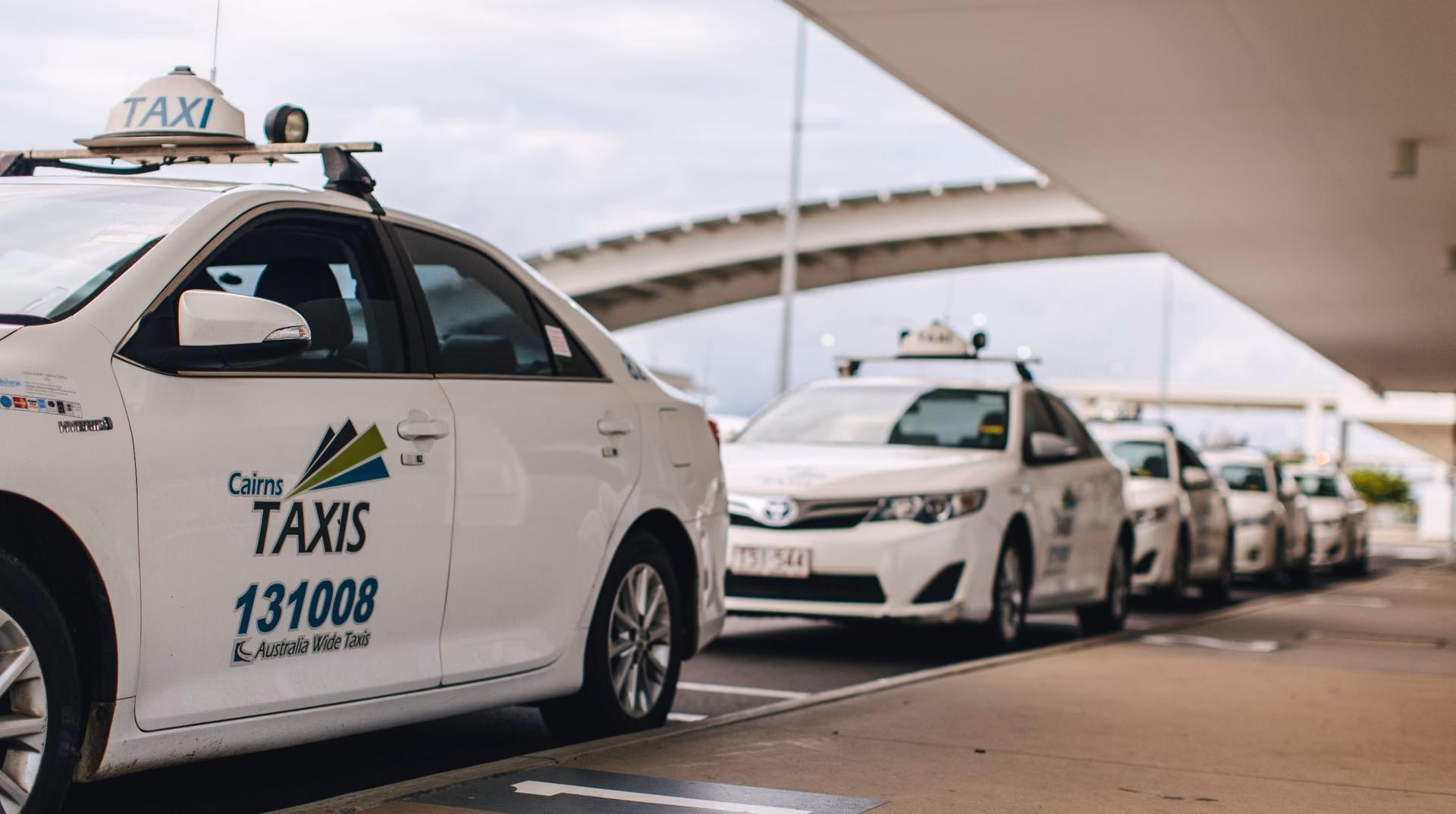 Where can I get a private transfer from Port Douglas to Cairns?