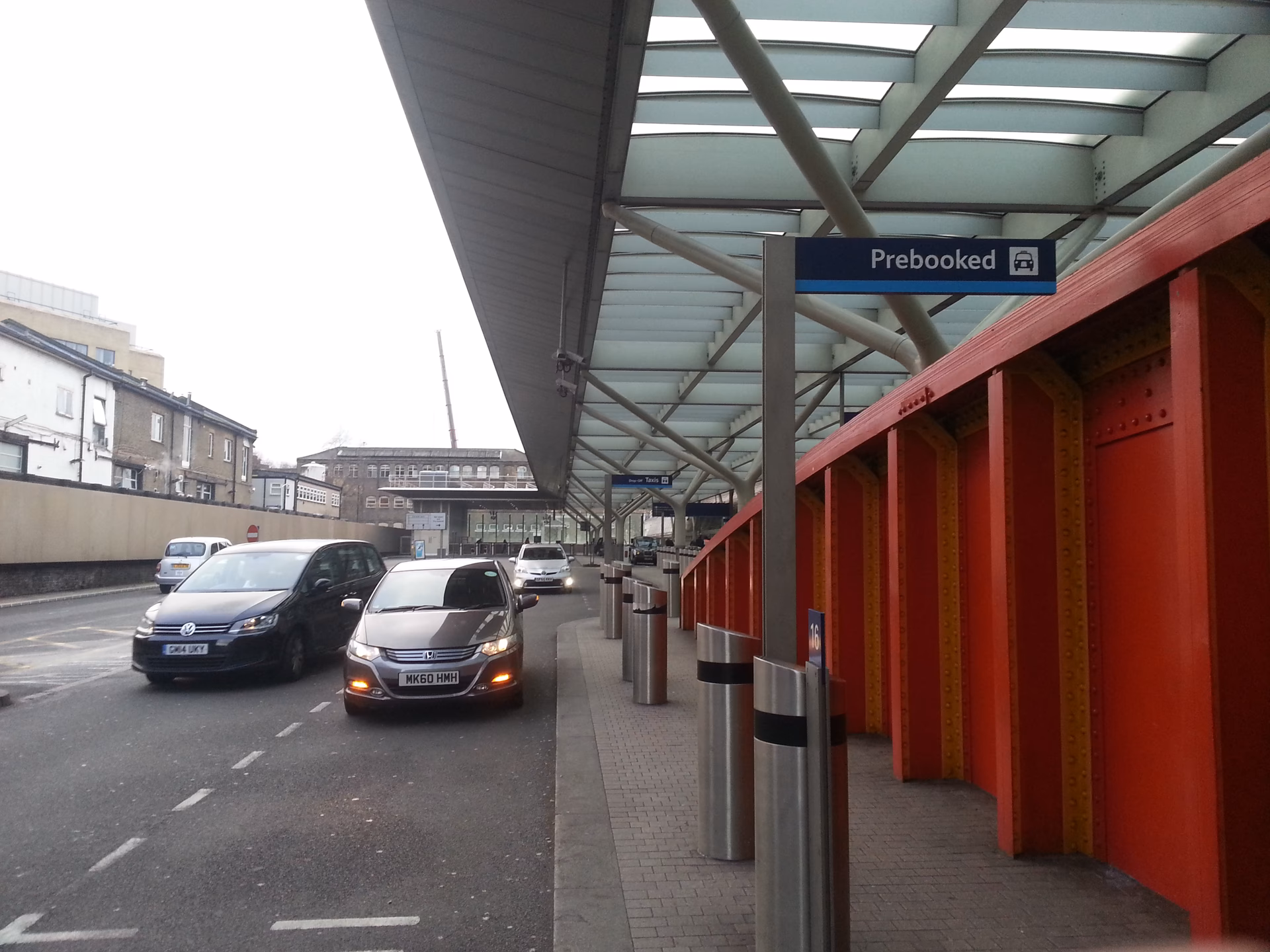 Where can I pick up a private car at Paddington station?