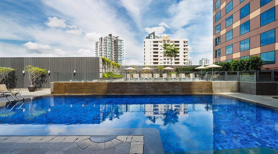 What companies run services between Grand Mercure Singapore Roxy and Singapore?