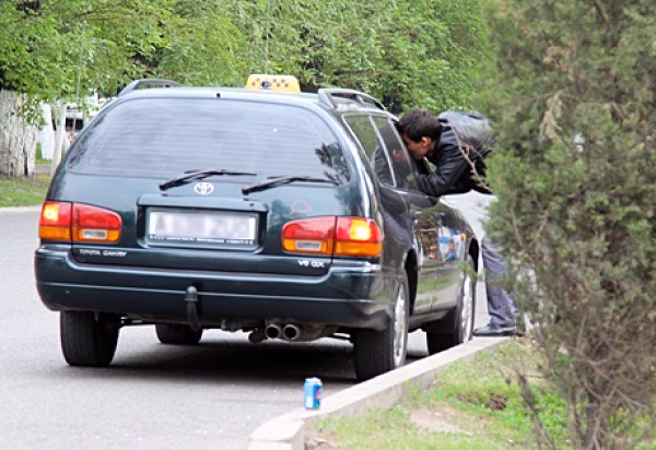 Do you offer a taxi service in Almaty?