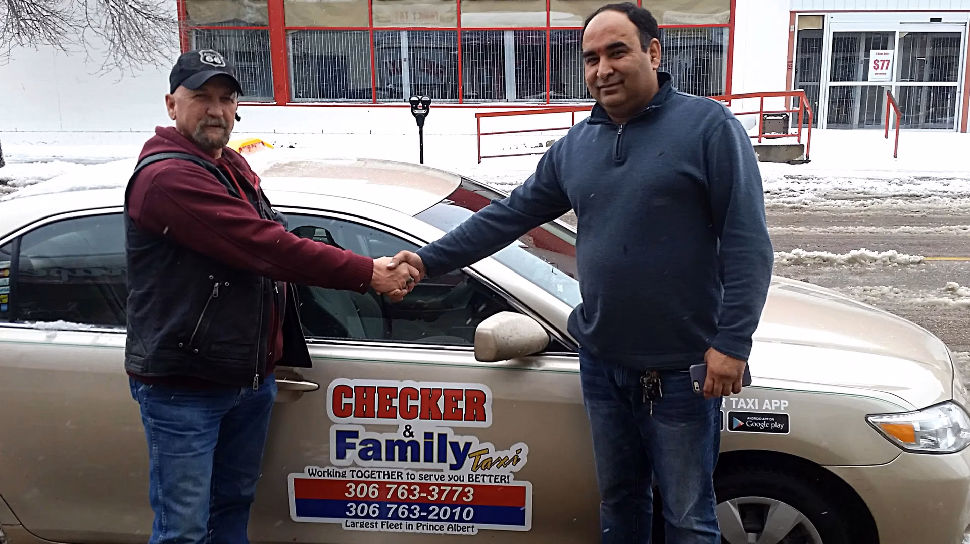 What is the phone number for Checker & family taxi?