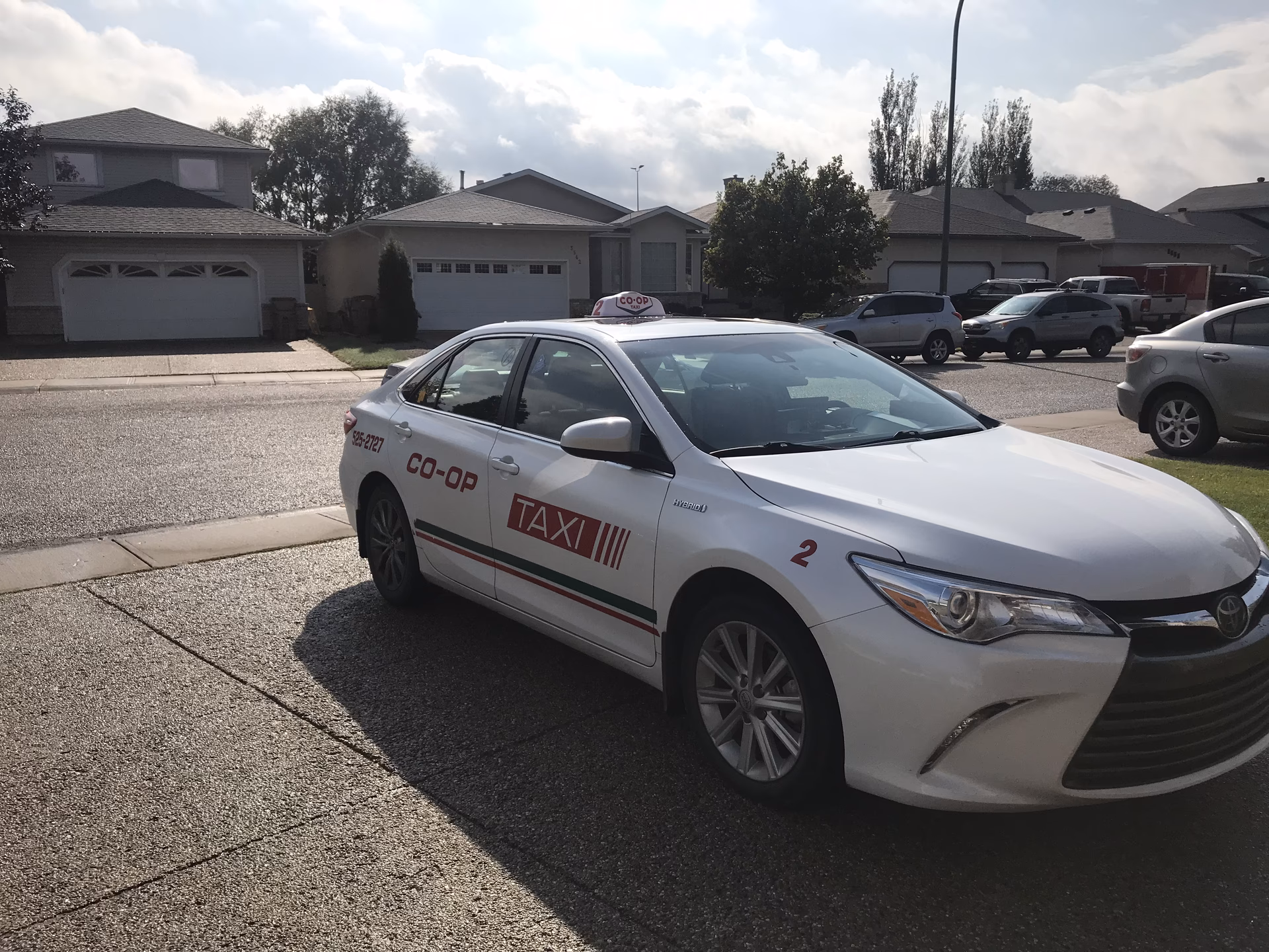 Does co-op taxi provide drop offs to Regina International Airport?