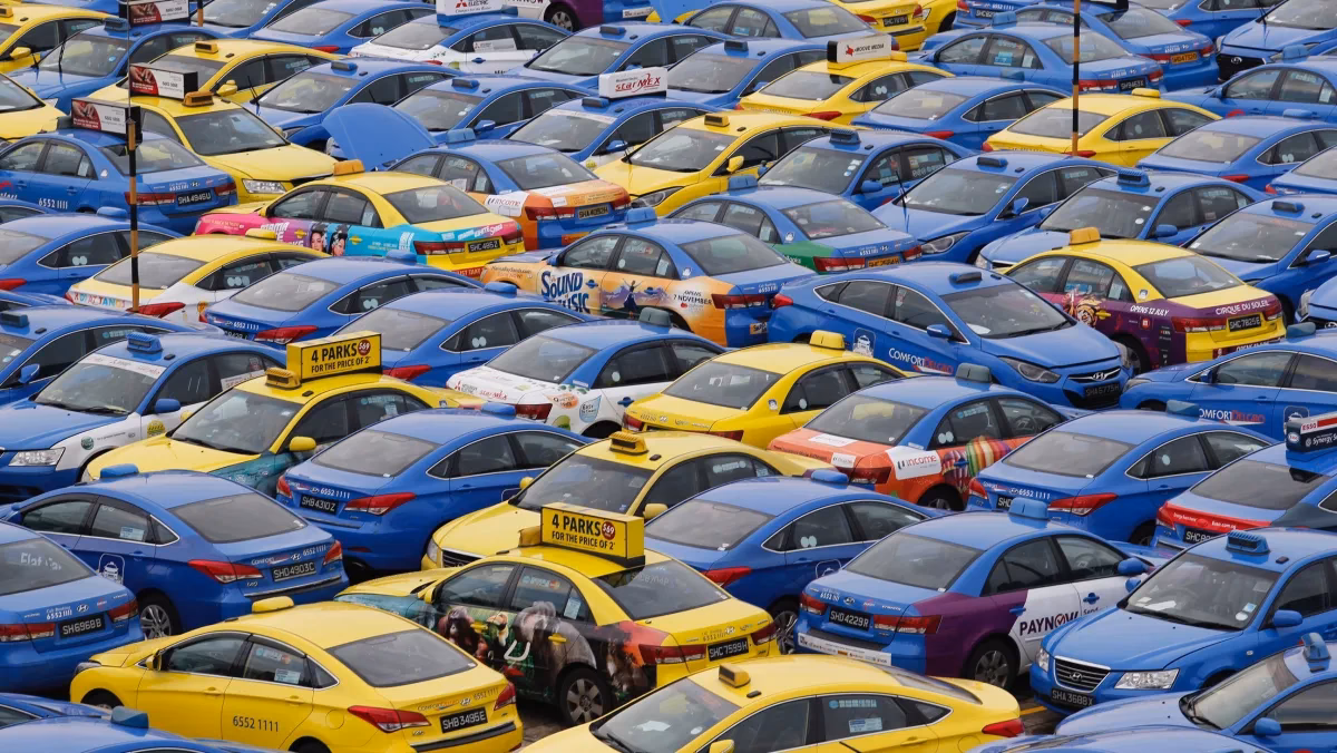 Does ComfortDelGro have a taxi fleet?