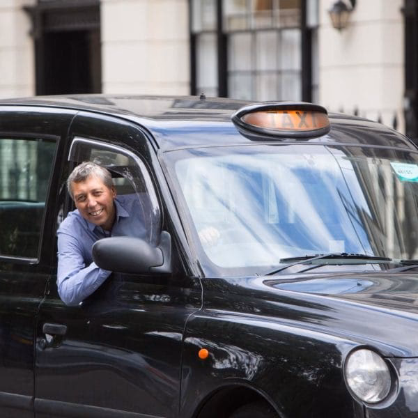 How does a taxi fare calculator work in Oldham?