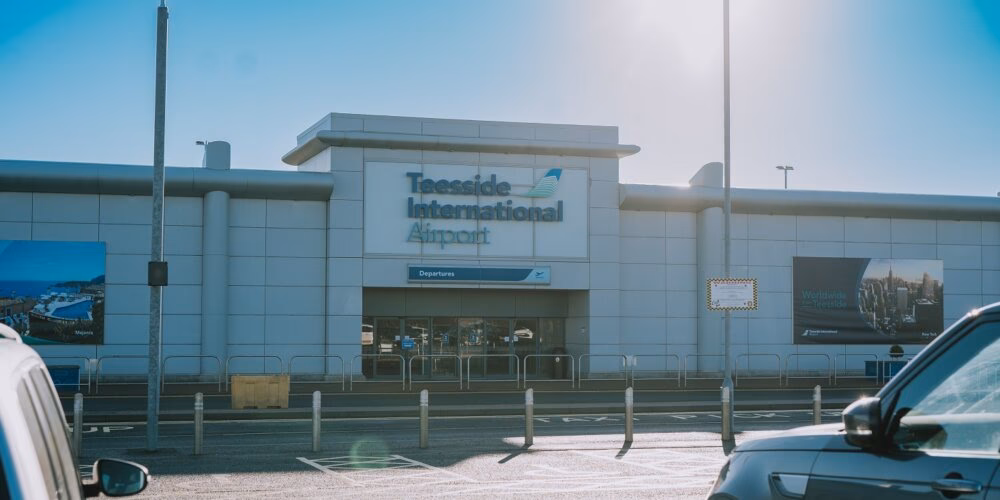 How far is Darlington from Teesside Airport station?