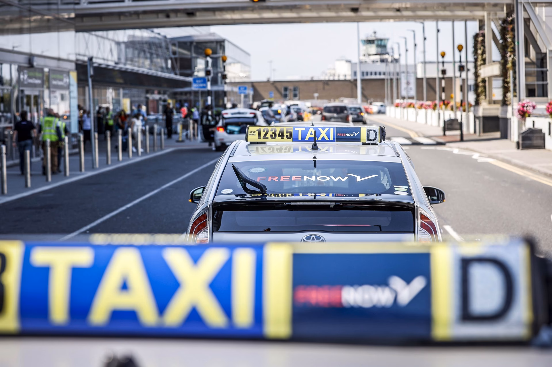 Can a Dublin Airport taxi permit holder hold more than one permit?