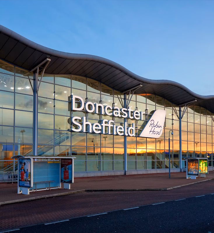 How long does a taxi take from Barnsley to Manchester Airport?