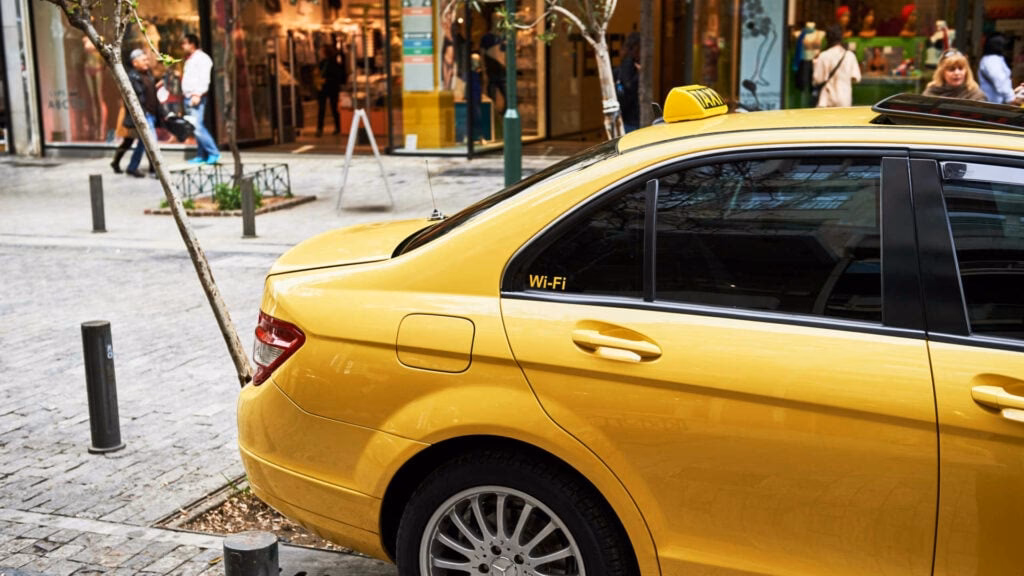 How do I book a taxi from Strathaven to Edinburgh Airport?