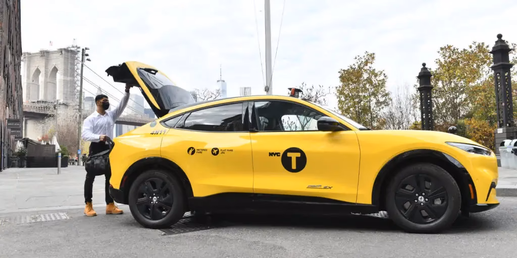 How many electric vehicles does Phoenix Taxis have?