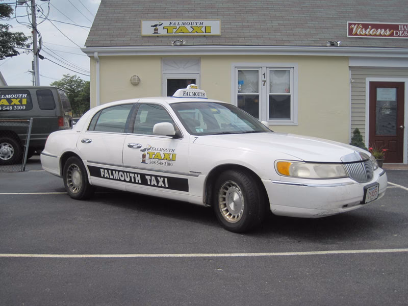 How does a taxi fare calculator work in Falmouth?