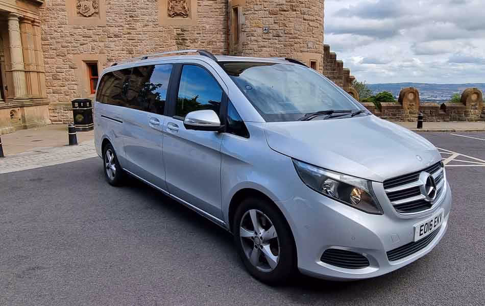 Which minibus services are available at Belfast International Airport?