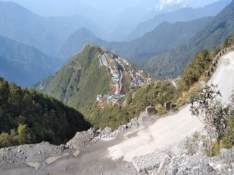 How far is Lake Tsomgo from Gangtok?