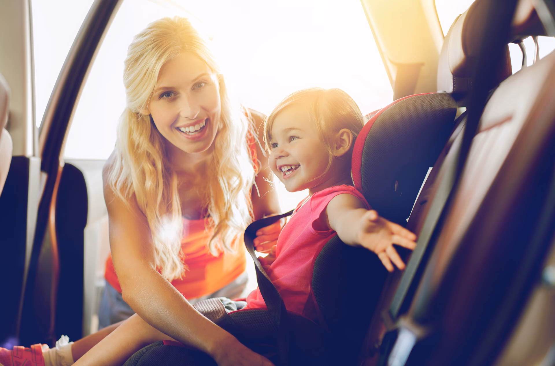 Can a child be carried in a passenger seat in Spain?