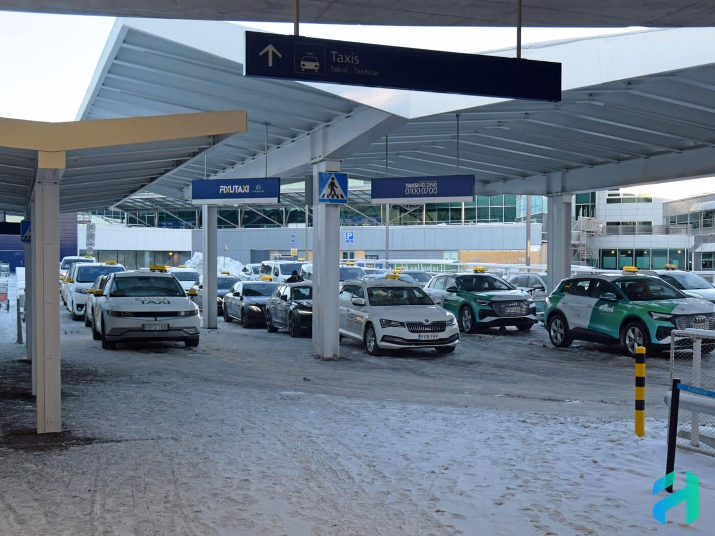 Where are the taxi ranks at Helsinki Airport?