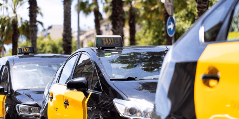 How many passengers can a taxi carry in Barcelona?