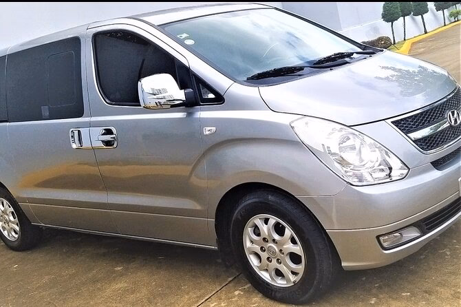 What companies run services from Santiago Airport (STI) to Puerto Plata?