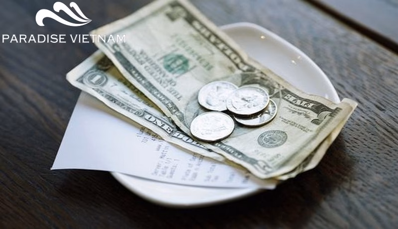 What currency is used for tipping in Vietnam?