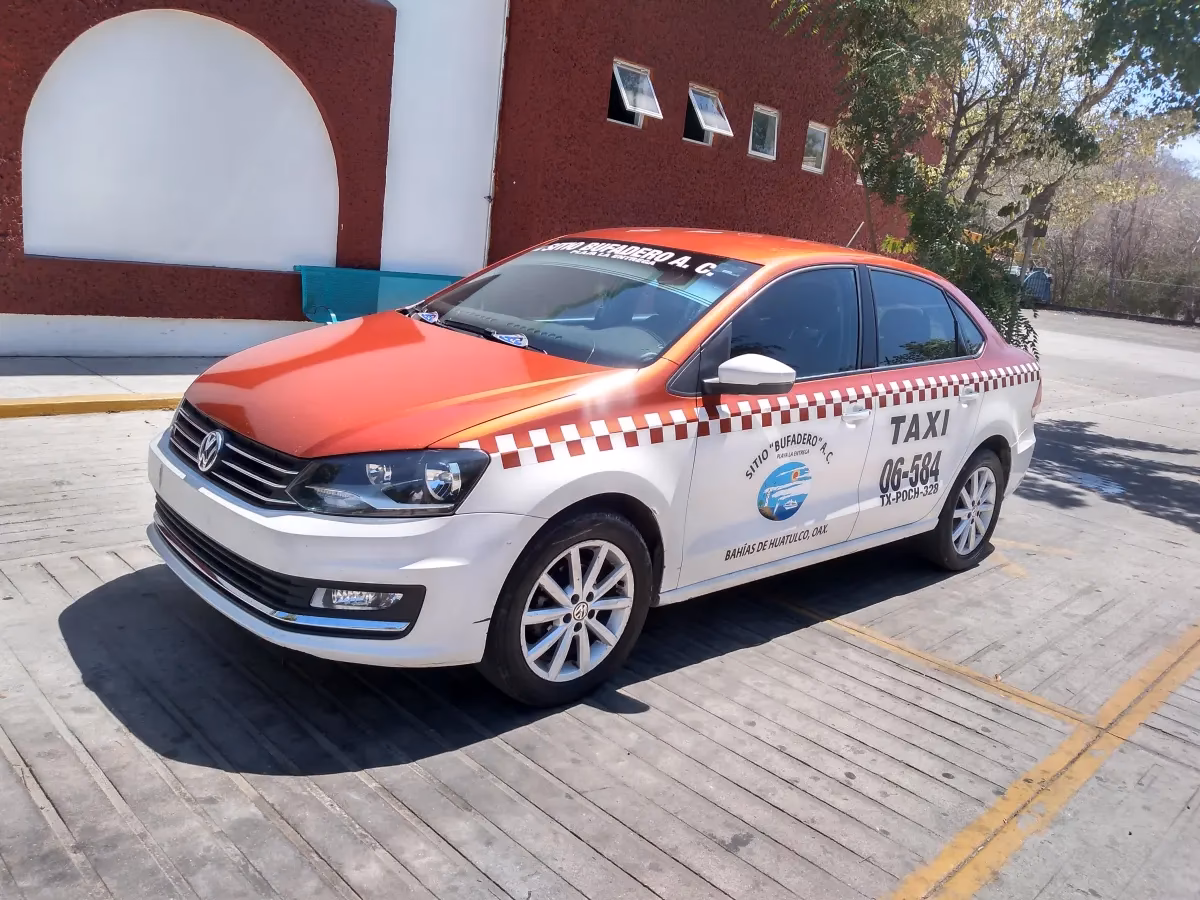 Where can I get a taxi from Huatulco airport?