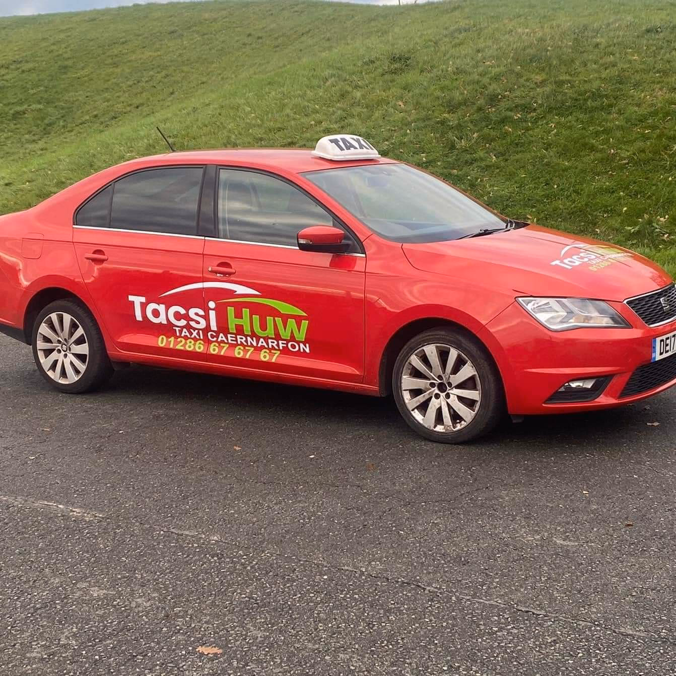 Where is Huws taxi located?