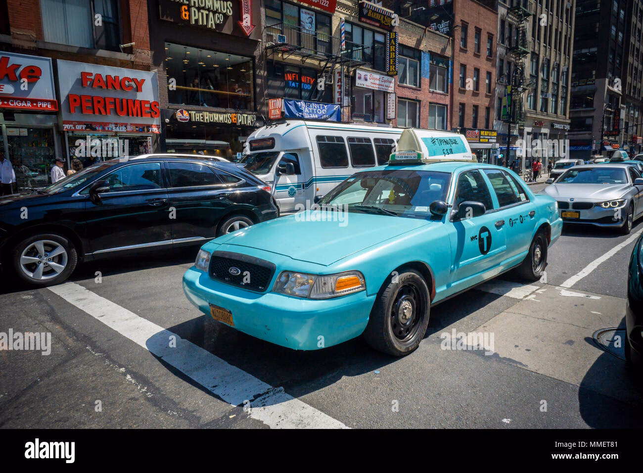What colour are taxis in Canada?