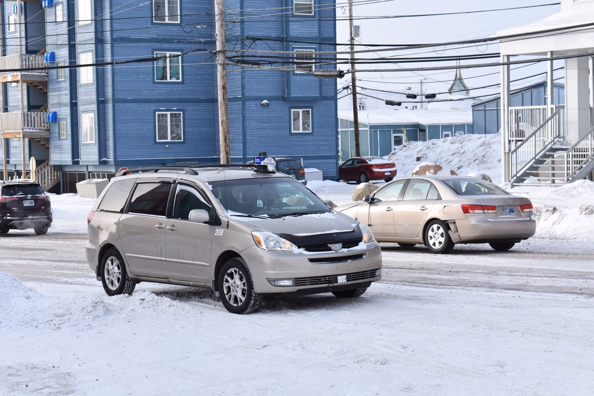 When does the new Taxi rate go into effect in Iqaluit?