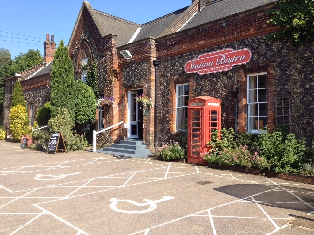 Who manages Wymondham train station?