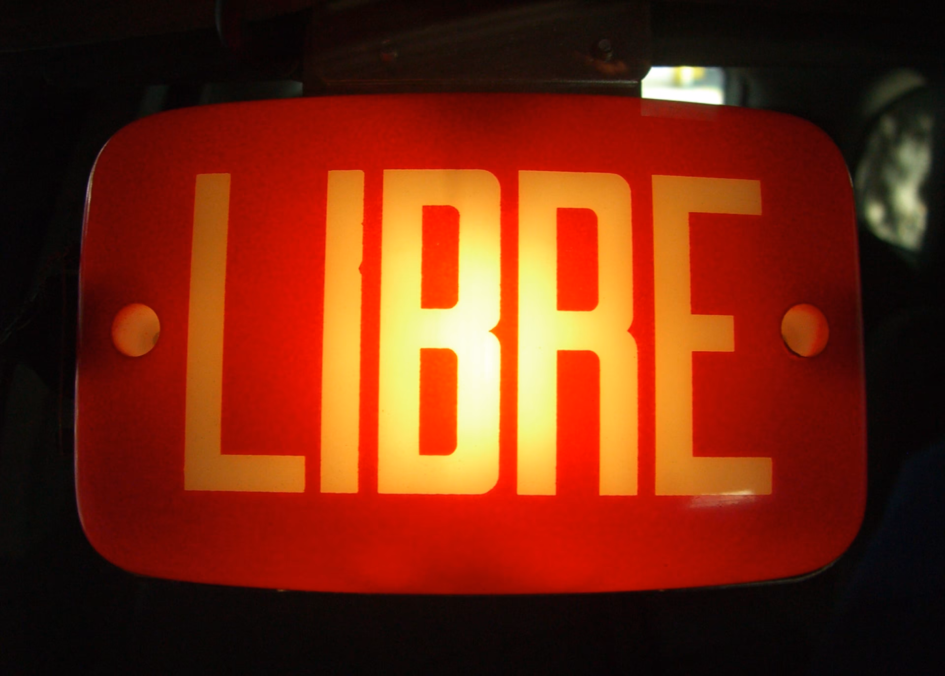 How can libretaxi be extended with JavaScript programming?