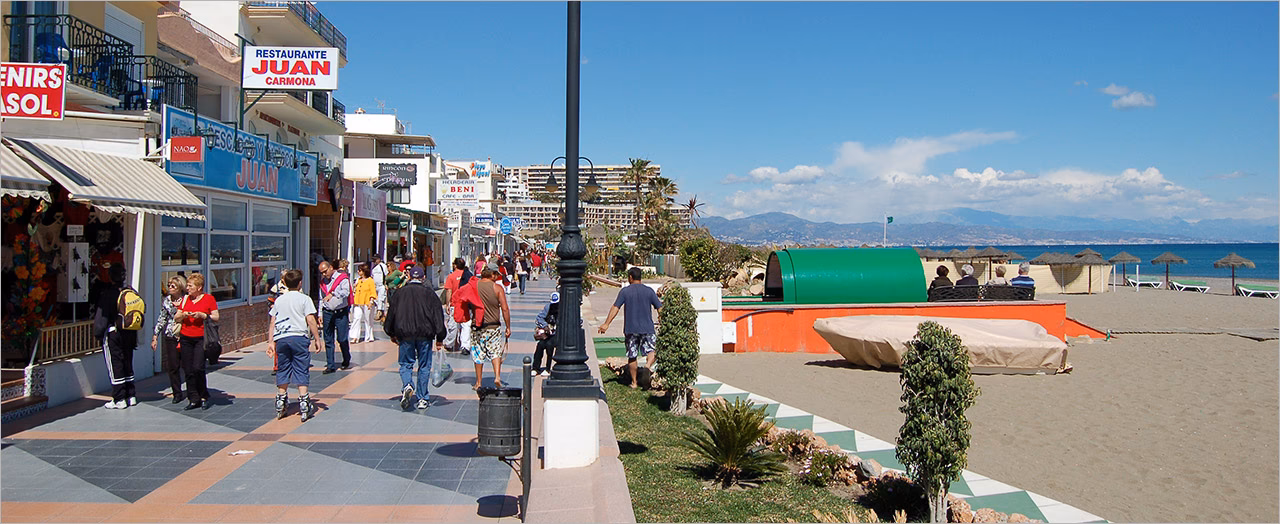 How far is Malaga Airport from Torremolinos?