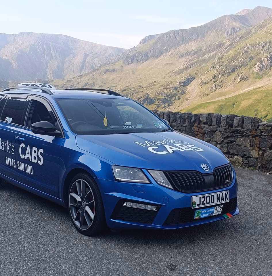 Who is Mark's taxi service?