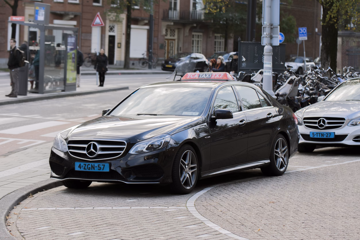 How to book a taxi in Amsterdam & Rotterdam?