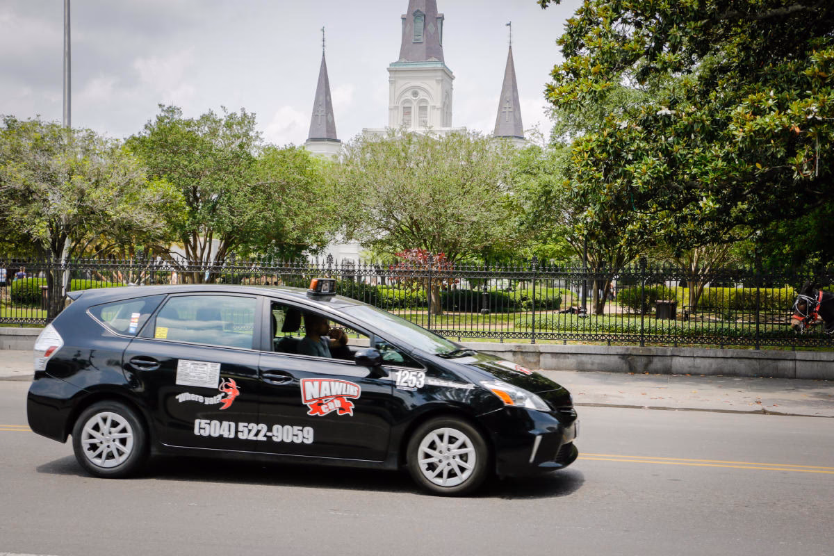 Do I need to call a taxi company in New Orleans?
