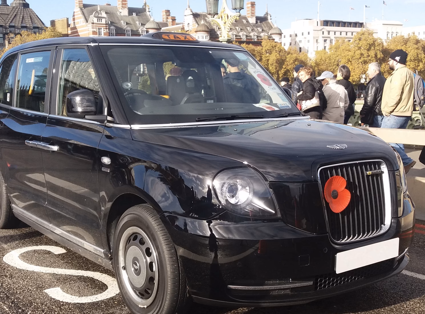 How do I buy a poppy cabs badge?